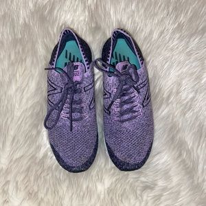purple new balance tennis shoes